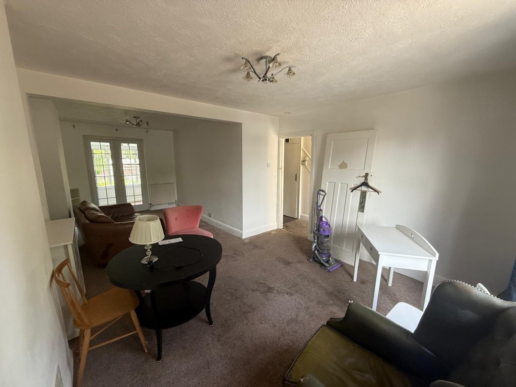 Lot: 31 - SEMI-DETACHED HOUSE FOR REFURBISHMENT IN POPULAR VILLAGE - Living room from another angle